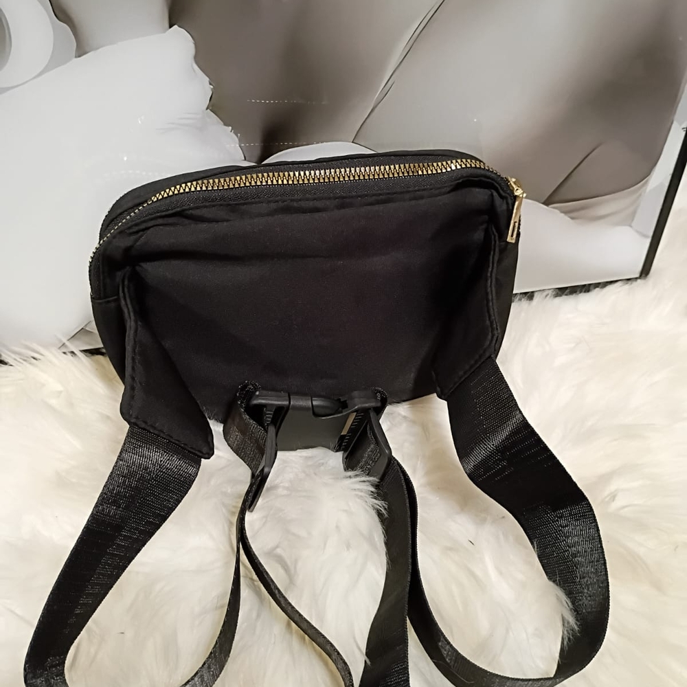 Chic Black Quilted Beltbag with Gold Accents
